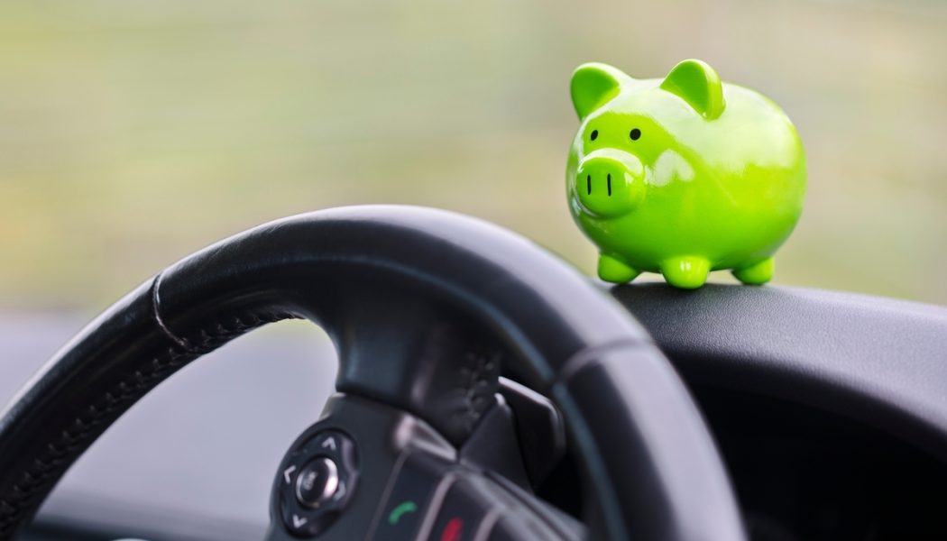 Green,Piggy,Bank,Money,Box,In,Car,Interior,,Vehicle,Purchase,